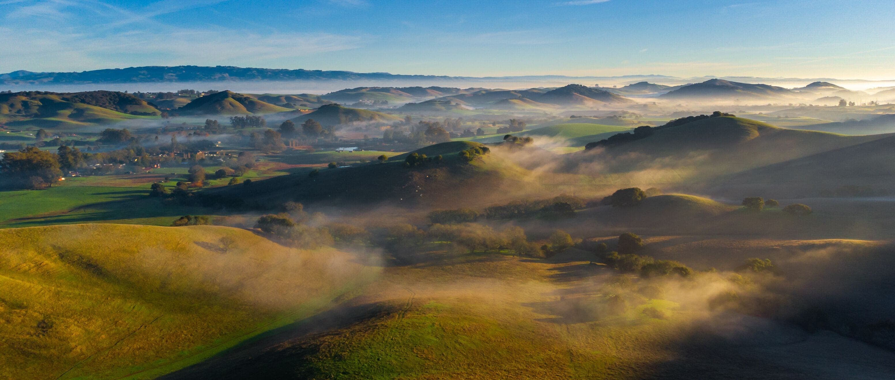Morning fog over the rolling hills around Valley Springs